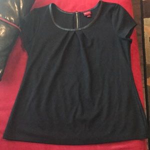 Black top with leather lining around neck